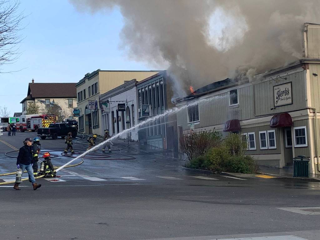 Heather Spaulding  Staff photo
Fire personnel battle the flames.