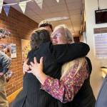 Heather Spaulding Staff photo
Auditor Milene Henley hugs Weyshawn Koons