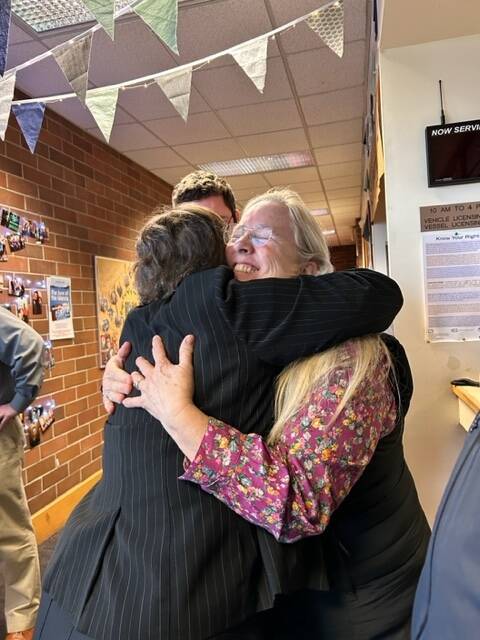 Heather Spaulding Staff photo
Auditor Milene Henley hugs Weyshawn Koons