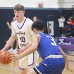 Heather Spaulding \ Staff photo
Nathan Posenjak takes the ball down court.