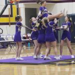 Heather Spaulding \ Staff photo
Wolverine Cheer Squad brings on the gymnastics during half-time