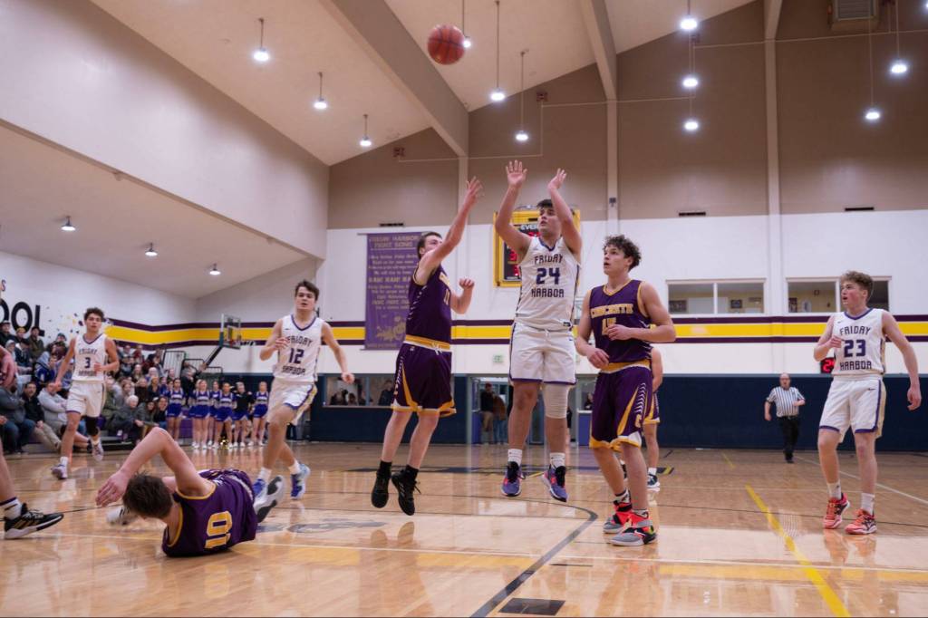 Contributed photo by Kathryn Wheeler
Chris Gustafson takes a shot.