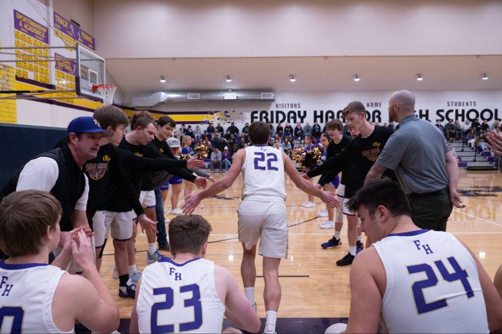 Contributed photo by Kathryn Wheeler
The boys enter the court as the game kicks off.