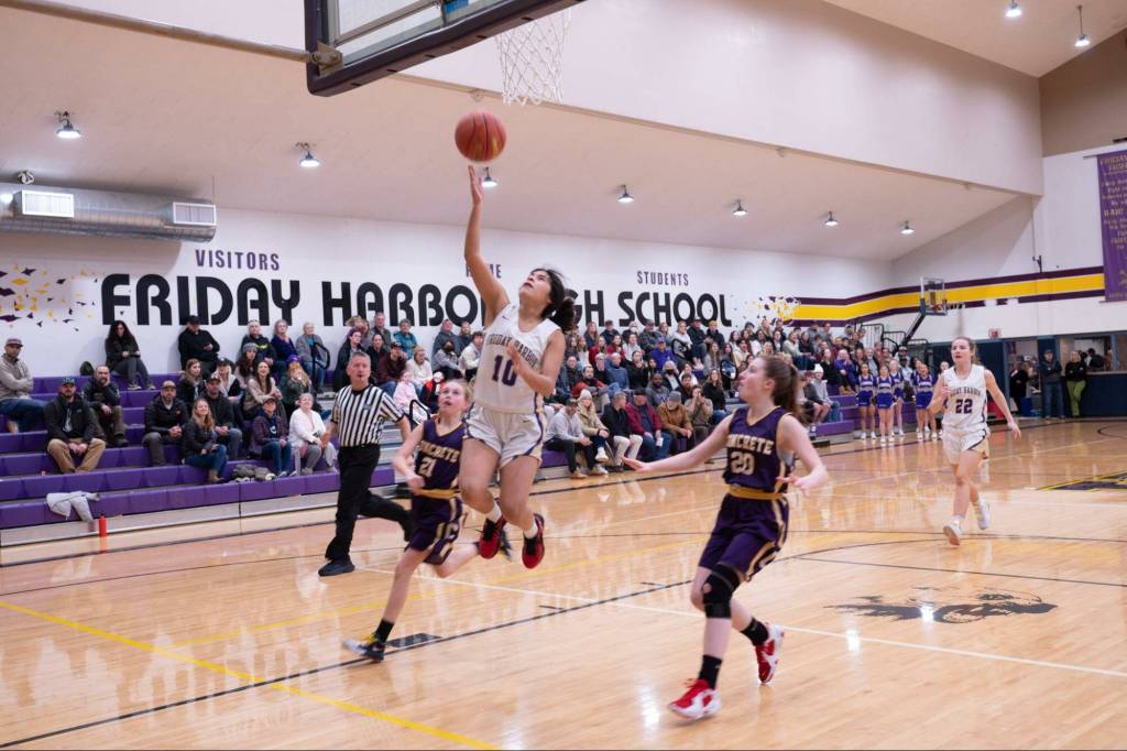 Contributed photo by Kathryn Wheeler
Perla Garcia-Sanabria airborne as she takes a shot.