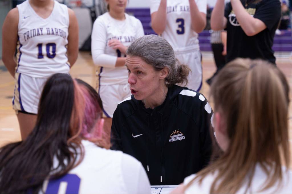 Contributed photo by Kathryn Wheeler
Coach Sue Grenfell strategizes with the team.