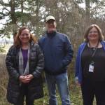 Kelley Balcomb-Bartok/Staff photo
U.S. Congressman Rick Larsen poses with San Juan County Council members Christine Minney and Cindy Wolf during a recent visit to Zylstra Lake on San Juan Island.