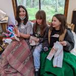 Contributed photo by Alchemy Art Center
Students prepare lettering for Save Salmon banner.
