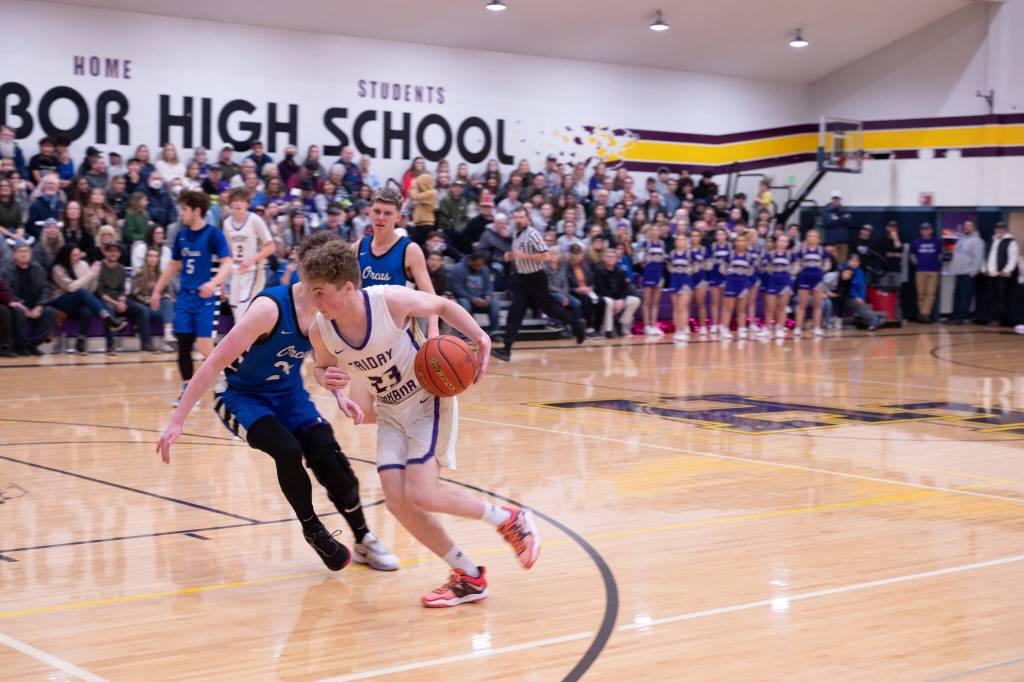 Contributed photo by Kathryn Wheeler
Drake Goodrich takes the ball down court.