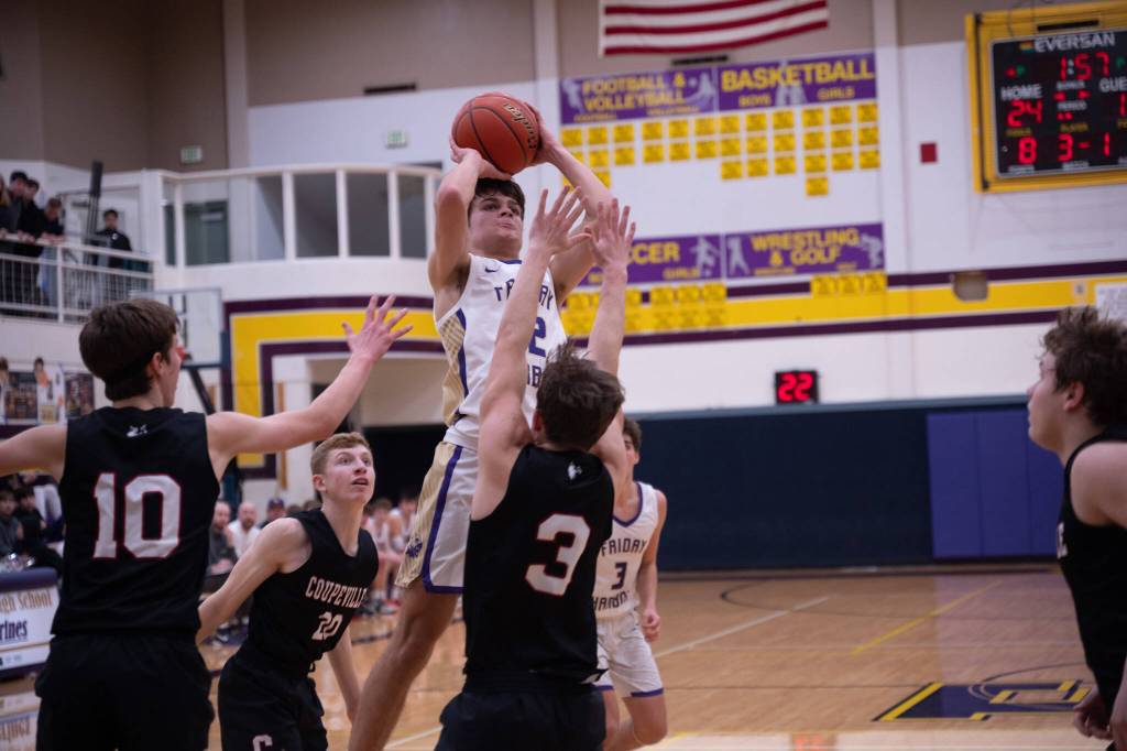 Contributed photo by Kathryn Wheeler
The Wolverines work past Coupeville blocking to make a shot.