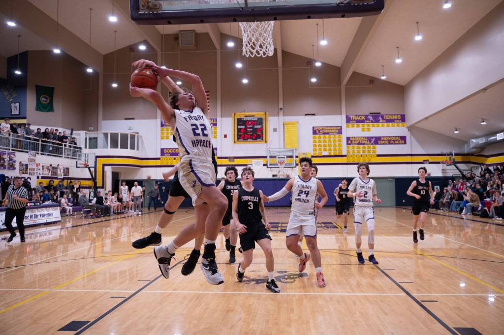 Contributed photo by Kathryn Wheeler
An airborne Pierce Kleine fights to take a shot.