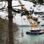 Contributed photo
The partially submerged Tugboat Tulalip is suspended near the Lopez ferry terminal in preparation for removal.