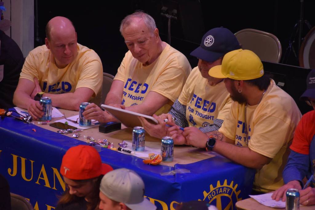 Kelley Balcomb-Bartok \ Staff photo
Rotary team members confer on a two-part question during the San Juan Public Schools Foundations 28th annual Knowledge Bowl.