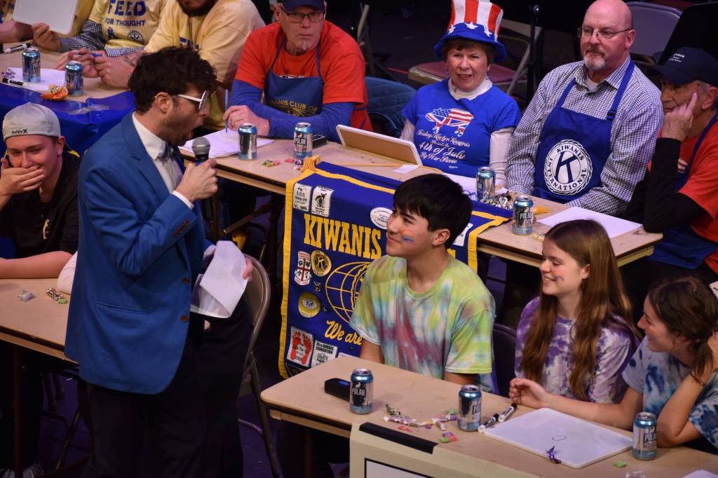 Kelley Balcomb-Bartok \ Staff photo
MC Mason Turnage entertains the audience while talking with the FHHS 11-12 grade team during the San Juan Public Schools Foundations 28th annual Knowledge Bowl.