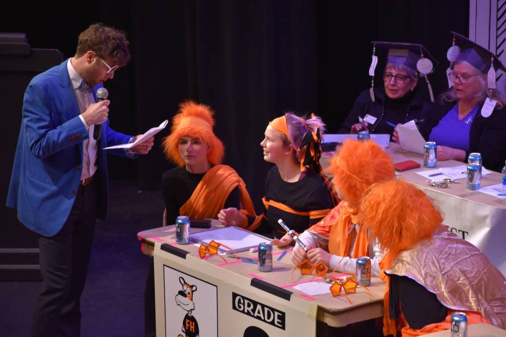 Kelley Balcomb-Bartok \ Staff photo
MC Mason Turnage checks his notes during the San Juan Public Schools Foundations 28th annual Knowledge Bowl.