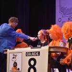 Kelley Balcomb-Bartok \ Staff photo
MC Mason Turnage holds the microphone for Liv Eisenhardt, a member of the Friday Harbor Middle School eighth grade team during the San Juan Public Schools Foundations 28th annual Knowledge Bowl.