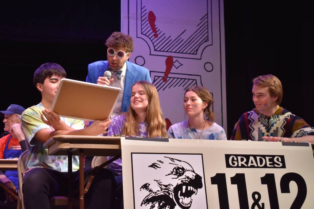 Kelley Balcomb-Bartok \ Staff photo
MC Mason Turnage checks the answer from the FHHS grade 11-12 team during the San Juan Public Schools Foundations 28th annual Knowledge Bowl.