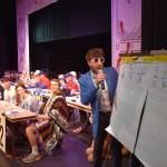 Kelley Balcomb-Bartok \ Staff photo
MC Mason Turnage reviews the scores following the first round of questions during the San Juan Public Schools Foundations 28th annual Knowledge Bowl.