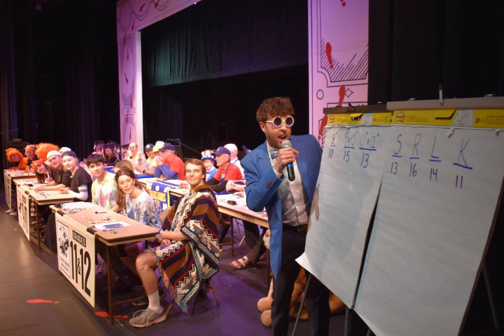 Kelley Balcomb-Bartok \ Staff photo
MC Mason Turnage reviews the scores following the first round of questions during the San Juan Public Schools Foundations 28th annual Knowledge Bowl.