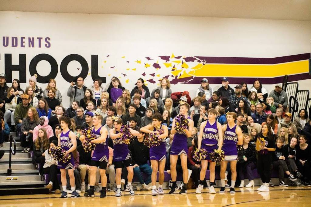 Aiden Haines/Staff photo
Wolverine cheerleaders celebrating with crowd