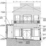 File photo 
40 Spring Street, the building most recently associated with Crystal Seas Kayaking, has a solid foundation built, walls and floors in place, and designs on returning to nearly the same look the building had prior to the blaze.
