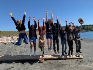 Contributed photo
Left to right: Esme, Jem, Sarah, Lael, Wyatt, Quinn, Shaw, and Jasper jump for joy as they are just about to leave for Nepal! Photo by Louis Prussack.
