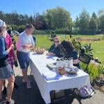 Contributed photo
Heritage Bank volunteers check in players at the Golf Fore! Scholarships.