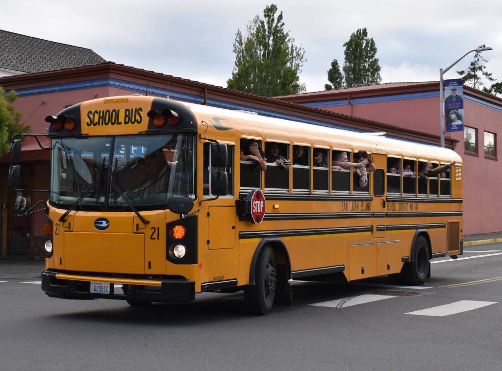 Kelley Balcomb-Bartok / Staff photo
The entire graduating Class of 2023 paraded through downtown Friday Harbor on their way to an overnight Grad Party experience at several Top Secret locations throughout the islands.
