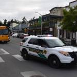 Kelley Balcomb-Bartok / staff photo
San Juan County Sheriff's Deputy Nick Wainwright led the bus containing the Friday Harbor High School graduates as they drove through downtown Friday Harbor with honking horns, sirens, and flashing lights.