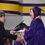 Kelley Balcomb-Bartok / Staff photo
FHHS Senior Larissa Mauldin accepts a scholarship from Becky Day, Director of the San Juan Island Chamber of Commerce. Mauldin plans on going to Central Washington University and majoring in education.