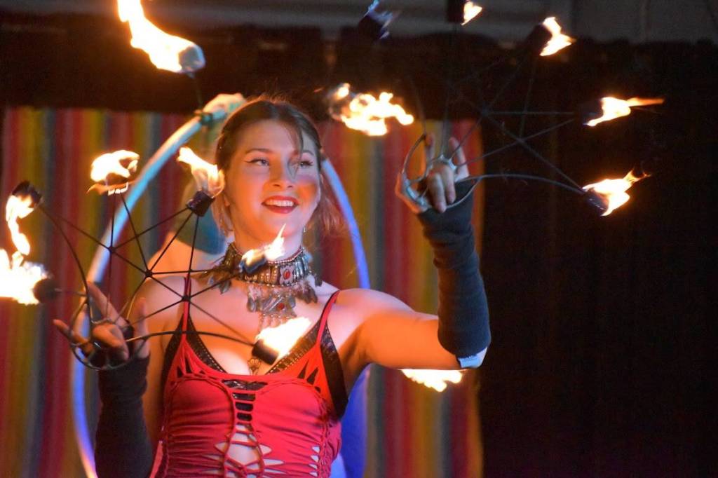 Kelley Balcomb-Bartok  Staff photo
Fire dancer with flaming hoops.