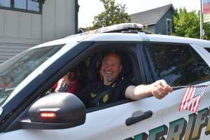 Kelley Balcomb-Bartok \ staff photo
Sheriff Eric Peter and wife Jennifer lead the 2023 parade Marching Forward Together through downtown Friday Harbor.