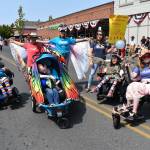 Kelley Balcomb-Bartok staff photo
Members of the Young Adult Association of San Juan Island (Y.A.A.S.) celebrate by marching forward together during the 2023 Fourth of July parade in Friday Harbor.