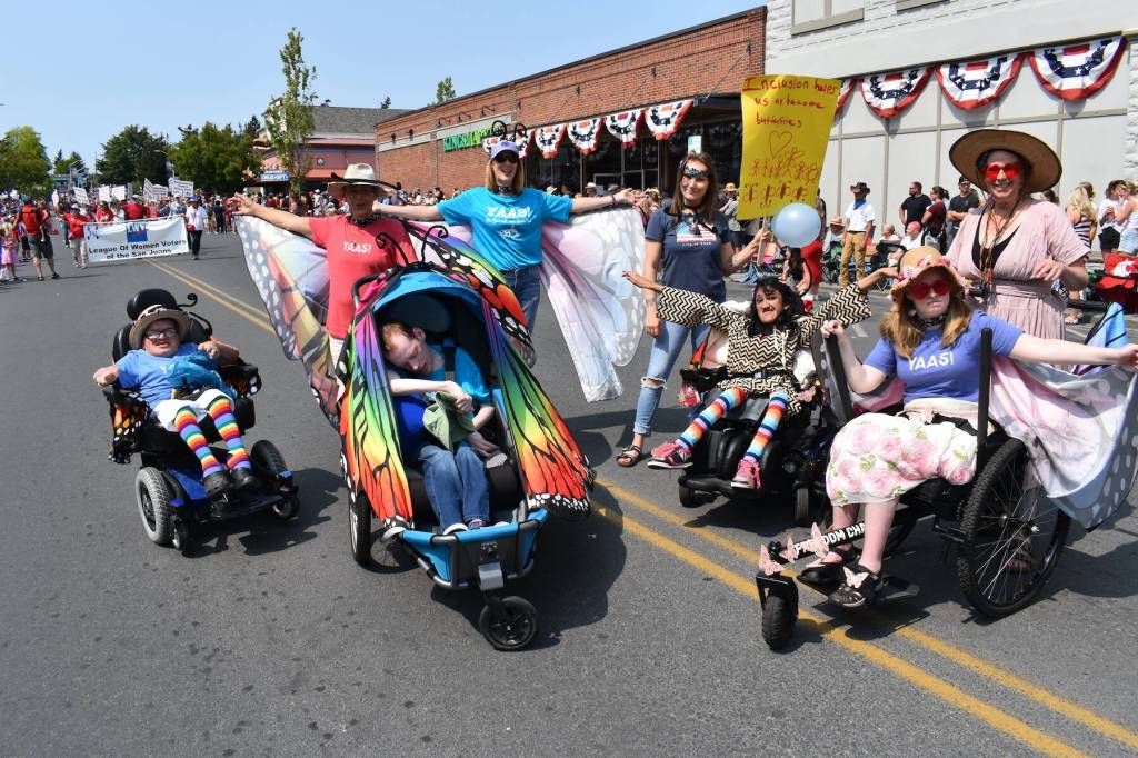 Kelley Balcomb-Bartok staff photo
Members of the Young Adult Association of San Juan Island (Y.A.A.S.) celebrate by marching forward together during the 2023 Fourth of July parade in Friday Harbor.