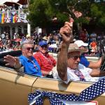 Kelley Balcomb-Bartok staff photo
Grand Marshalls Brian Brown, Dave Moorehouse, and Tom Starr wave to the crowd.