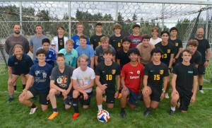 Kathryn Wheeler / Staff photo 
Boys Soccer Team. Back Row, left to right: Coach Dan Fuller, Coach Ryder Cuddington, Emilio Bayas, Andrew Rezabek, Phoenix Lehman, Alden Carli, Cole Curtis, Will Youngsman, Bryce Ridwan, Coach Sean Parsons. Middle Row, left to right: Coach Brett Paul, Luciano Canales Gallardo, Tucker Rennick, Evan Hiatt, Malachi Cullen, Abdul Guzman-Navarro, Matthew Van Dyck, Aaron Orozco, PJ Nixon. Front Row: Oliver Parkin, Grayson Matthews, Jack Hess, Mateo Zappelli, Isidro Churape, Lucian Colmenares, Joseph Holt. Not pictured : Elian Bayas, Henry Oswald, Forrest Goodremont, Neil Gresseth and Riley Miller