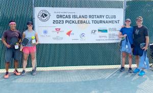 Group A Mixed Doubles finishers: Kevin and Christine Lee (second place) and Leah and Gib Black (first place).