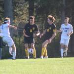 Heather Spaulding  Staff photo
Phoenix Lehman and Alden Carli work together to keep the ball.