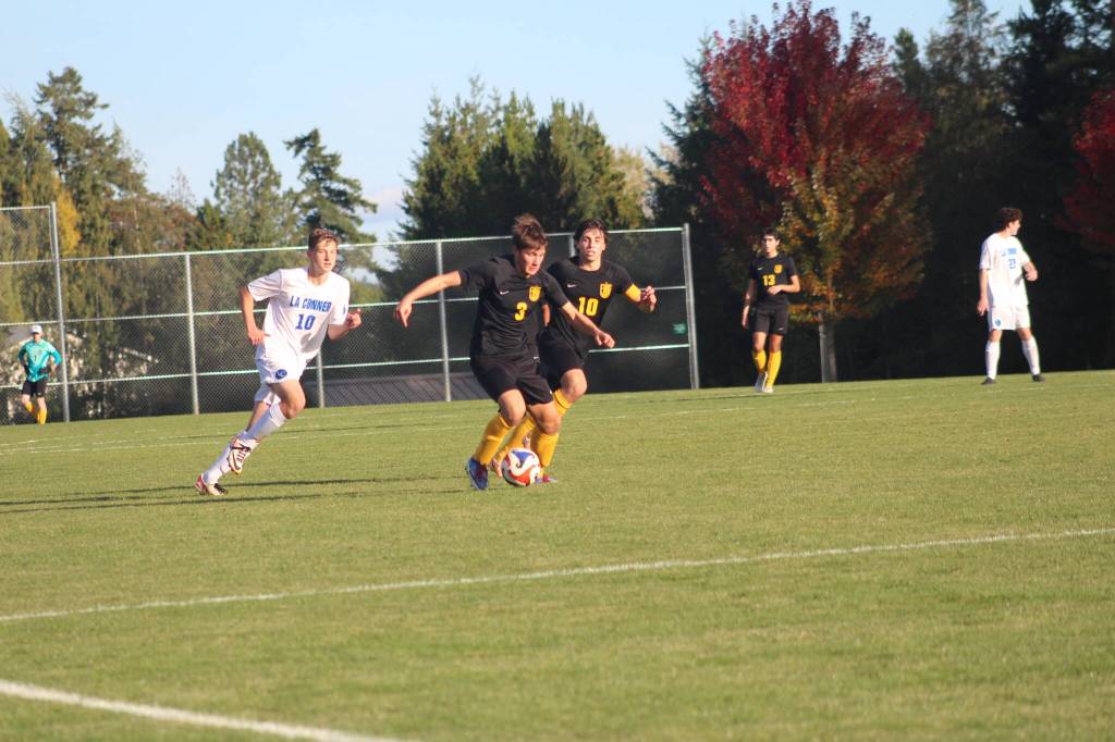 Heather Spaulding  Staff photo
Emilo Bayas and Mateo Zapelli move the ball down the field.