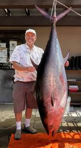 Contributed photo
Dr. Adam Summers standing next to the bluefin tuna for scale.