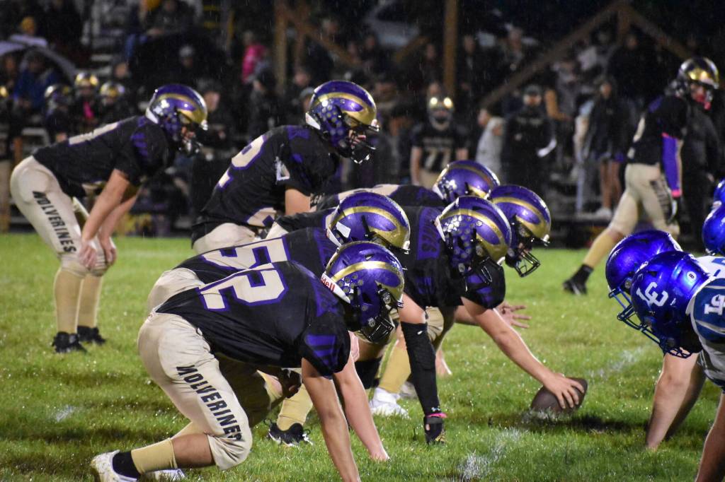 Kelley Balcomb-Bartok \ Staff photo
Wolverines prepare for another play.
