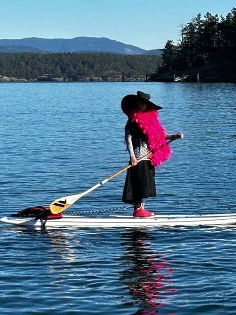 Heather Spaulding \ Staff photo
A witch dons a pink boa.