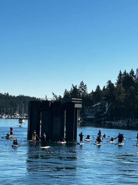 Heather Spaulding \ Staff photo
The ferry got out of the way just in time for the witches to paddle through.