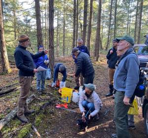Photo by Isabel Ashley
Doug McCutchen (left) gives an introduction to acorn-planting volunteers before they begin.