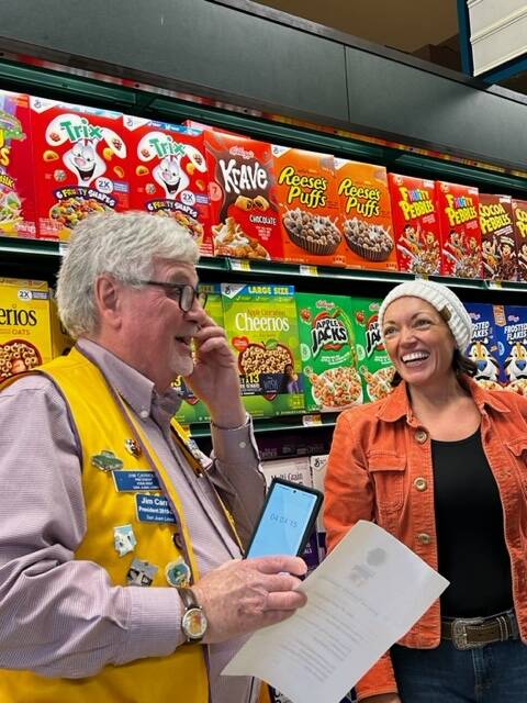 Heather Spaulding Staff photo
Lions member Jim Carroll with Rachelle Radonski