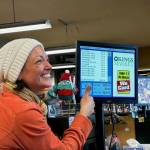 Heather Spaulding \ Staff photo
Rachelle Radonski pointing at the purchase total.