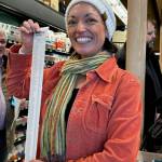 Heather Spaulding Staff photo
Rachelle Radonski holding the long receipt.