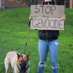 Heather Spaulding \ Staff photo
Amanda Garcia and her pup call for cease-fire