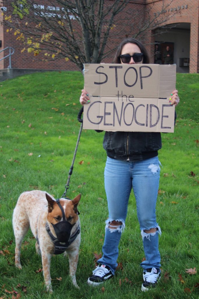 Heather Spaulding \ Staff photo
Amanda Garcia and her pup call for cease-fire