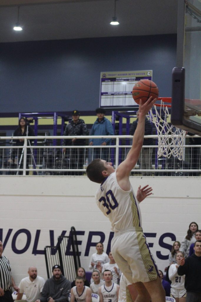 Isabel Ashley/Staff photo
Alden Carli, Senior, makes a layup.