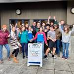 Contributed photo 
Katie, Jess and Mr. Garson, along with 13 enthusiastic Friday Harbor High School students at the Youth Earth Summit.